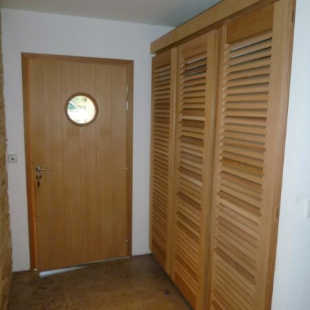Volets en bois Guignard porte en bois